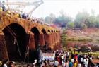 37 dead as bus falls into river